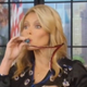 Illustration for article titled Kelly Ripa Drinks Wine From Own Bra